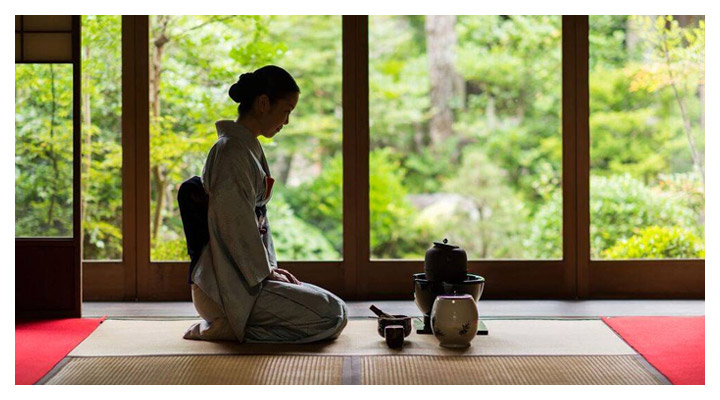 An exclusive tea ceremony in a historic Kyoto teahouse under a canopy of cherry blossoms